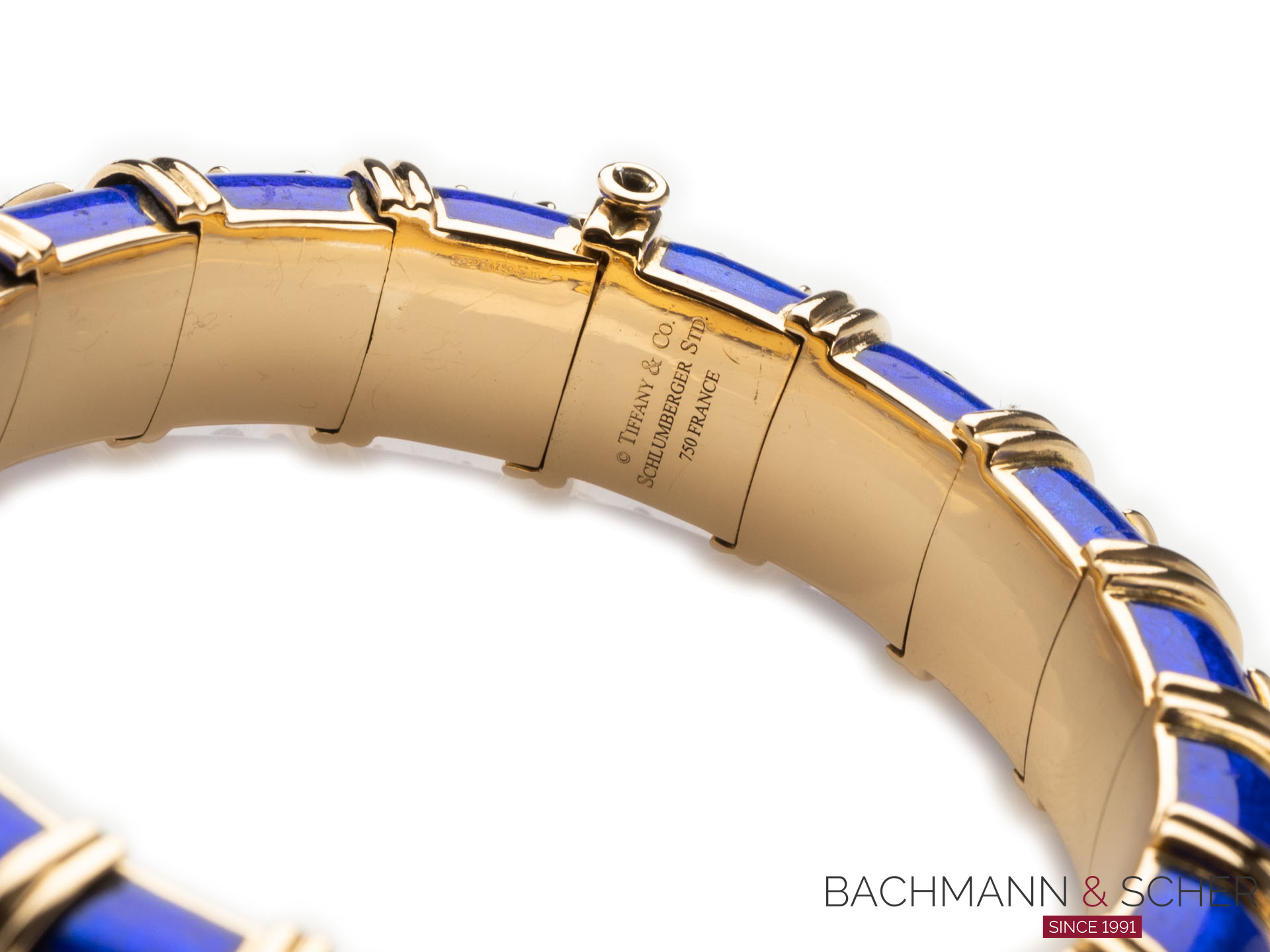 Sold at Auction: Tiffany & Co., Schlumberger Gold and Blue Paillonné Enamel  'Croisillon' Bangle Bracelet, France