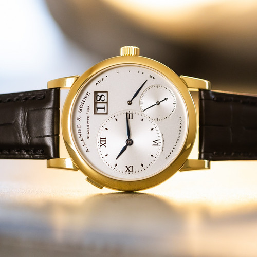 Clearly one rare and beautiful collectors piece! This outstanding and early Lange 1 Mark 1 has got the full gold back...